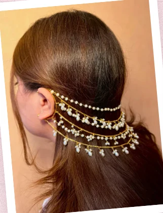 Legacy by Bisma pearl ear chain worn across the hair
